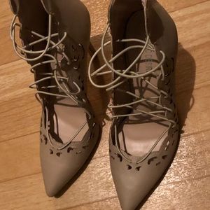 Sexy strappy stilettos with back zipper.